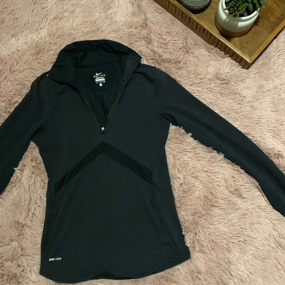 Women’s Nike Dri-fit jogger jacket.